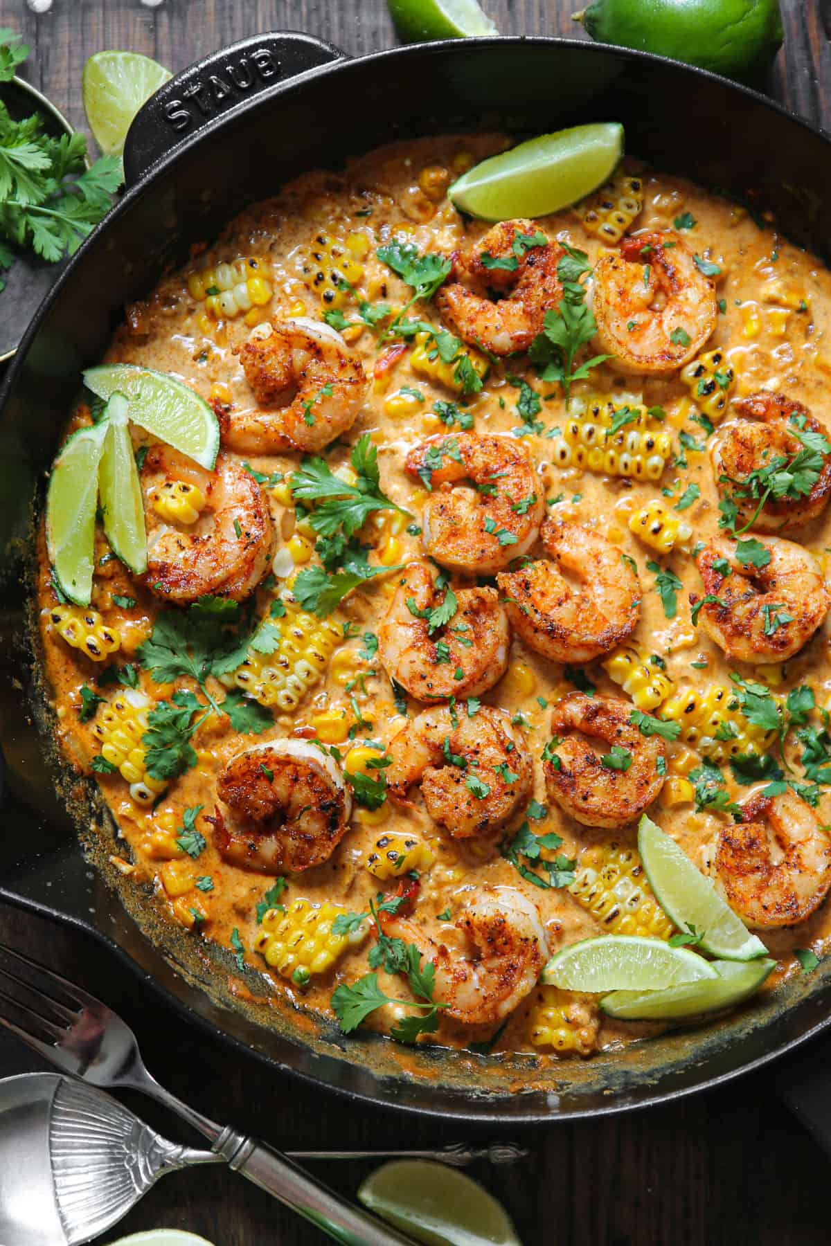 Shrimp and Creamed Corn in a cast iron skillet.