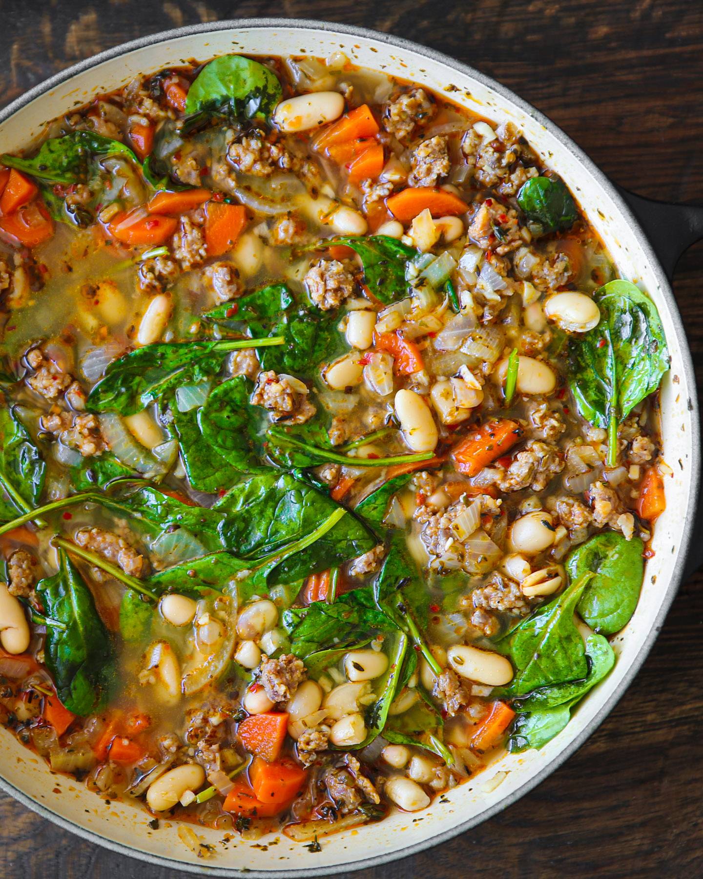 Sausage White Bean Soup in a white bowl.