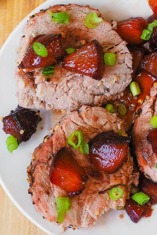 Pork Tenderloin with Sweet Balsamic Plum Sauce on a plate.