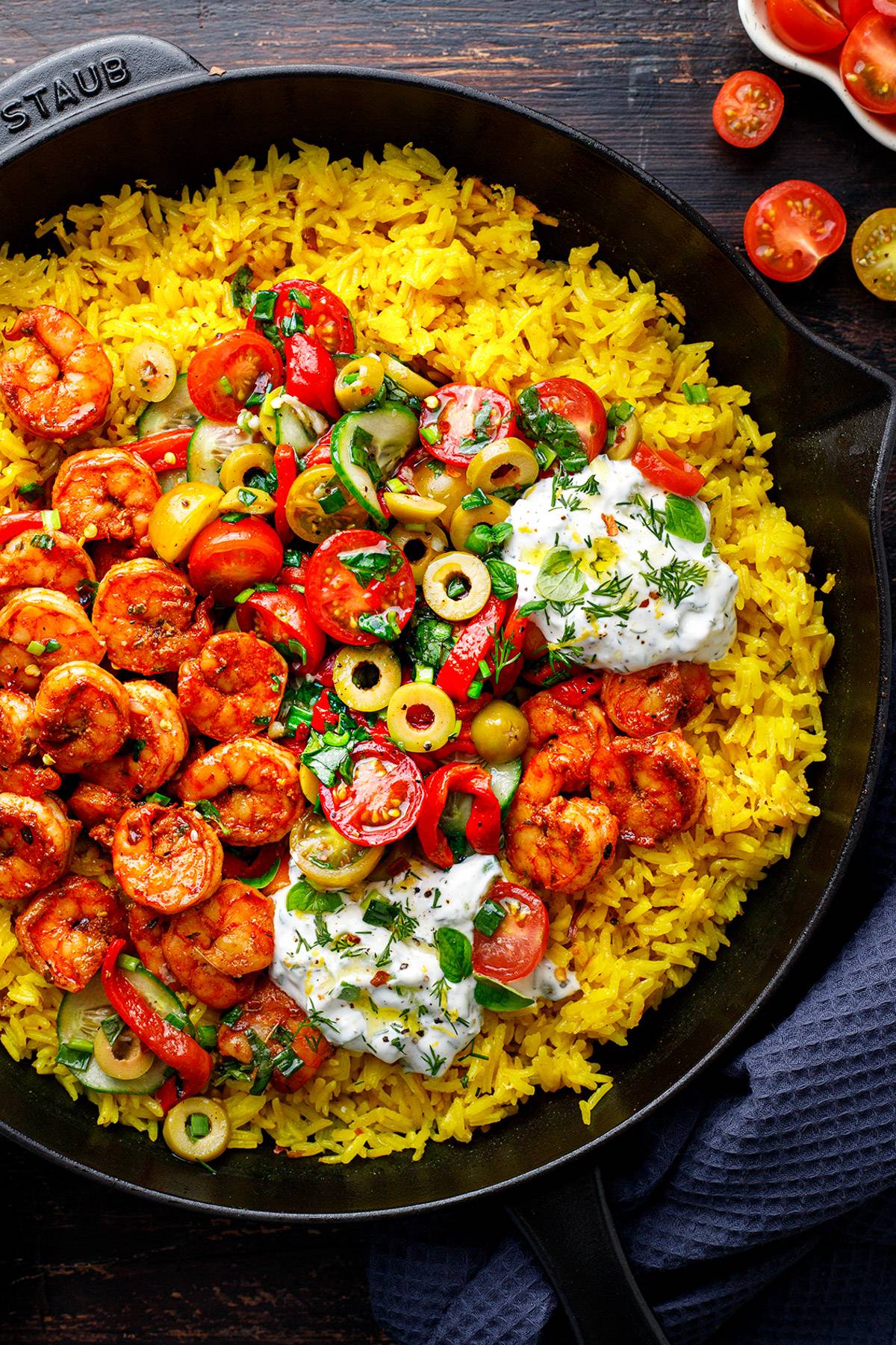 Greek Shrimp with Lemon Rice and Tzatziki - in a cast iron skillet.