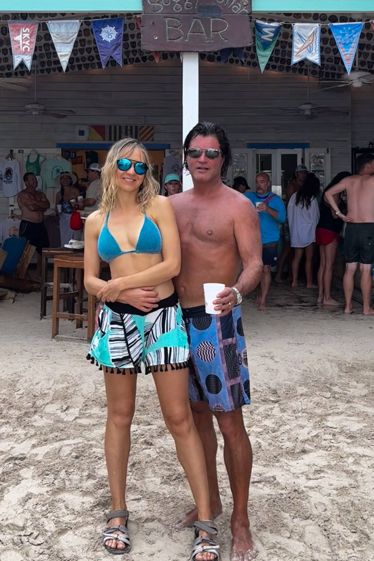 Julia with her husband at the Soggy Dollar Bar in BVI.