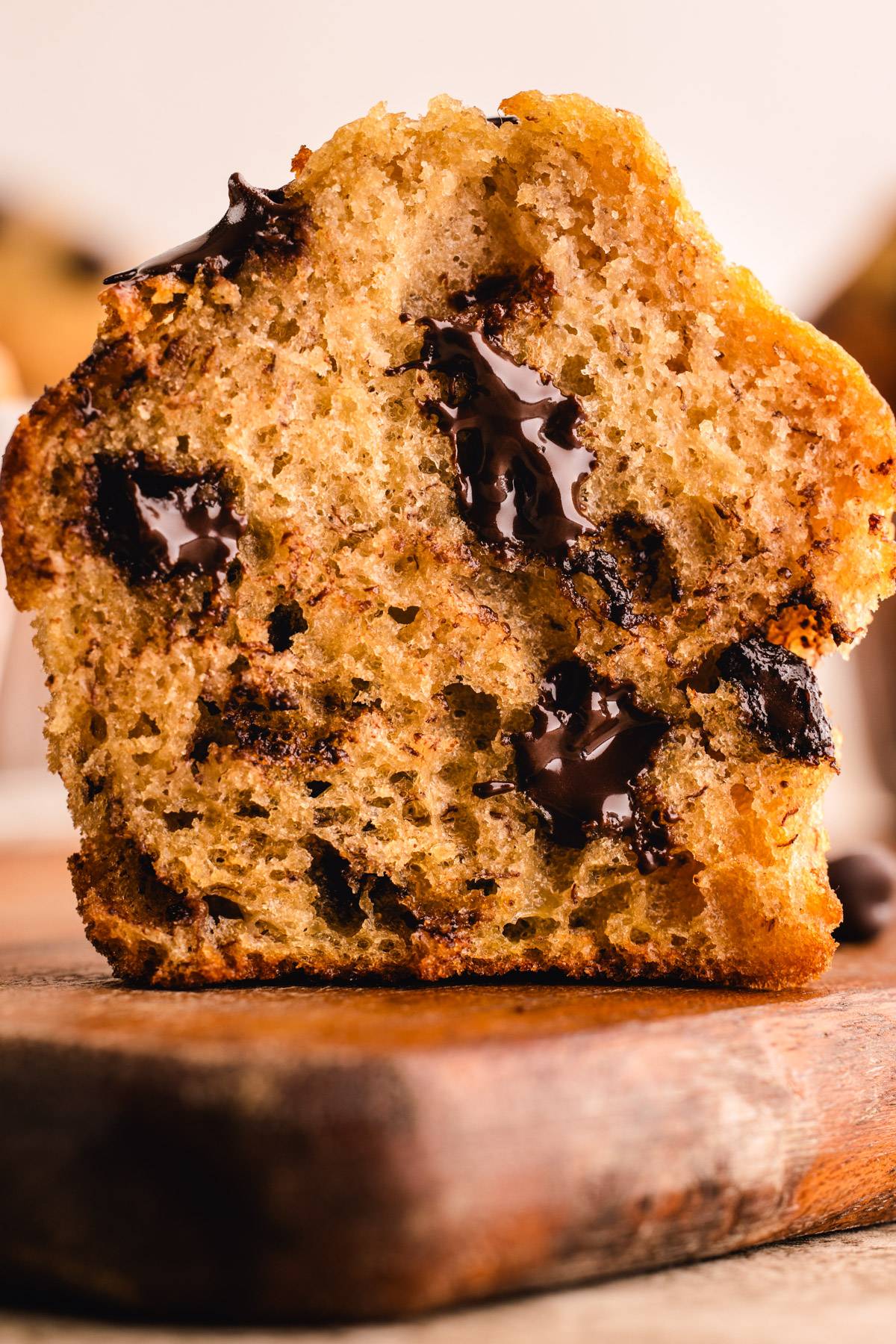 Banana Chocolate Chip Muffin (sliced in half revealing melted chocolate chips).