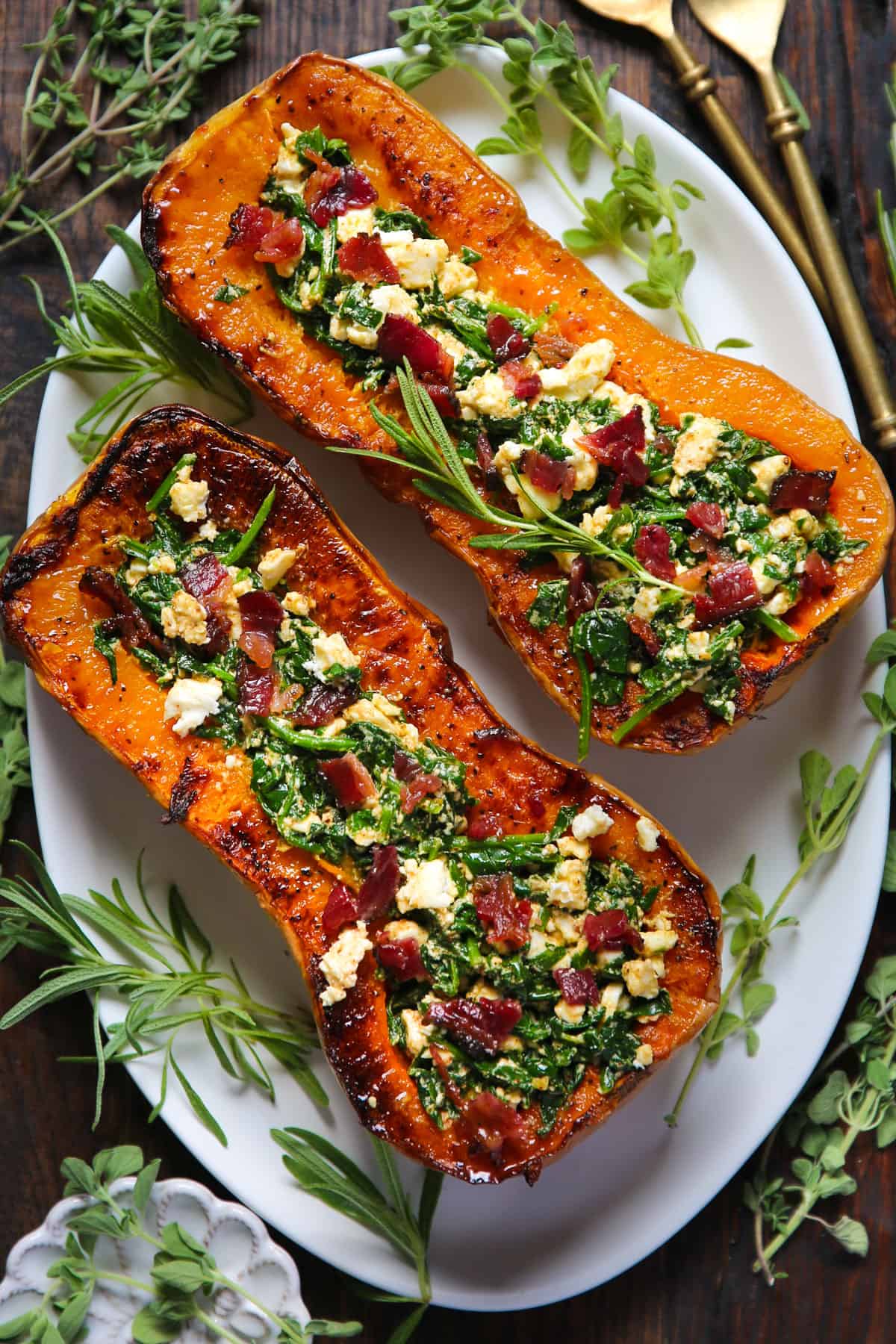 Stuffed Roasted Butternut Squash with Feta Cheese, Spinach, and Bacon.