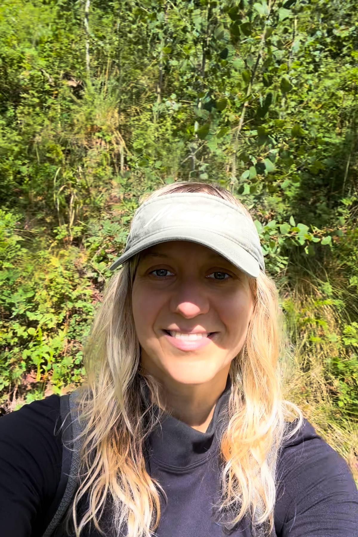 selfie of Julia outside hiking.