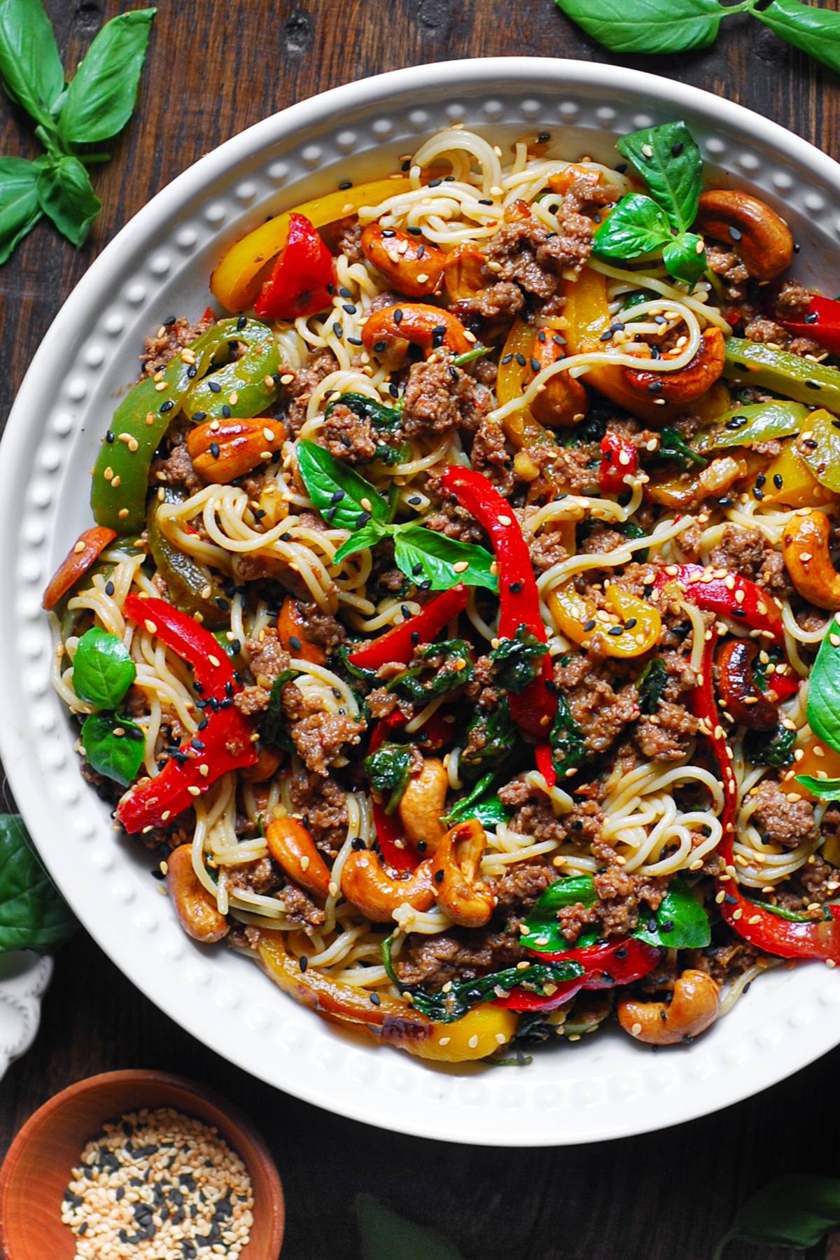 Ground Beef Ramen Noodle Stir Fry with Bell Peppers, Spinach, Cashews, and Sesame Seeds