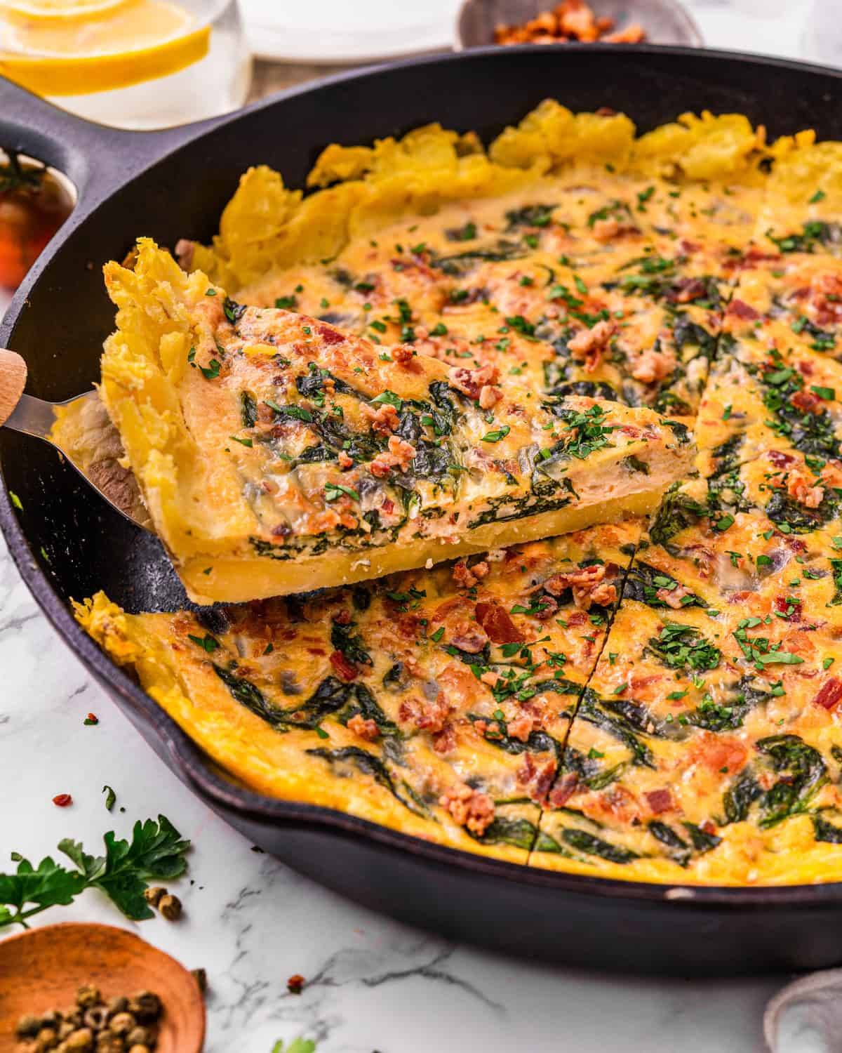 Gluten-Free Potato Crust Quiche (with spinach, bacon, and cheddar).