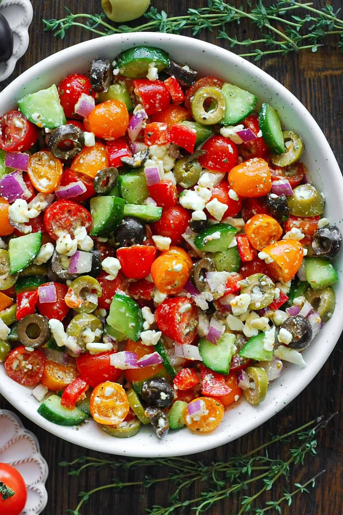 Greek Salad with  tomatoes, cucumber, bell pepper, olives, red onions, and feta cheese