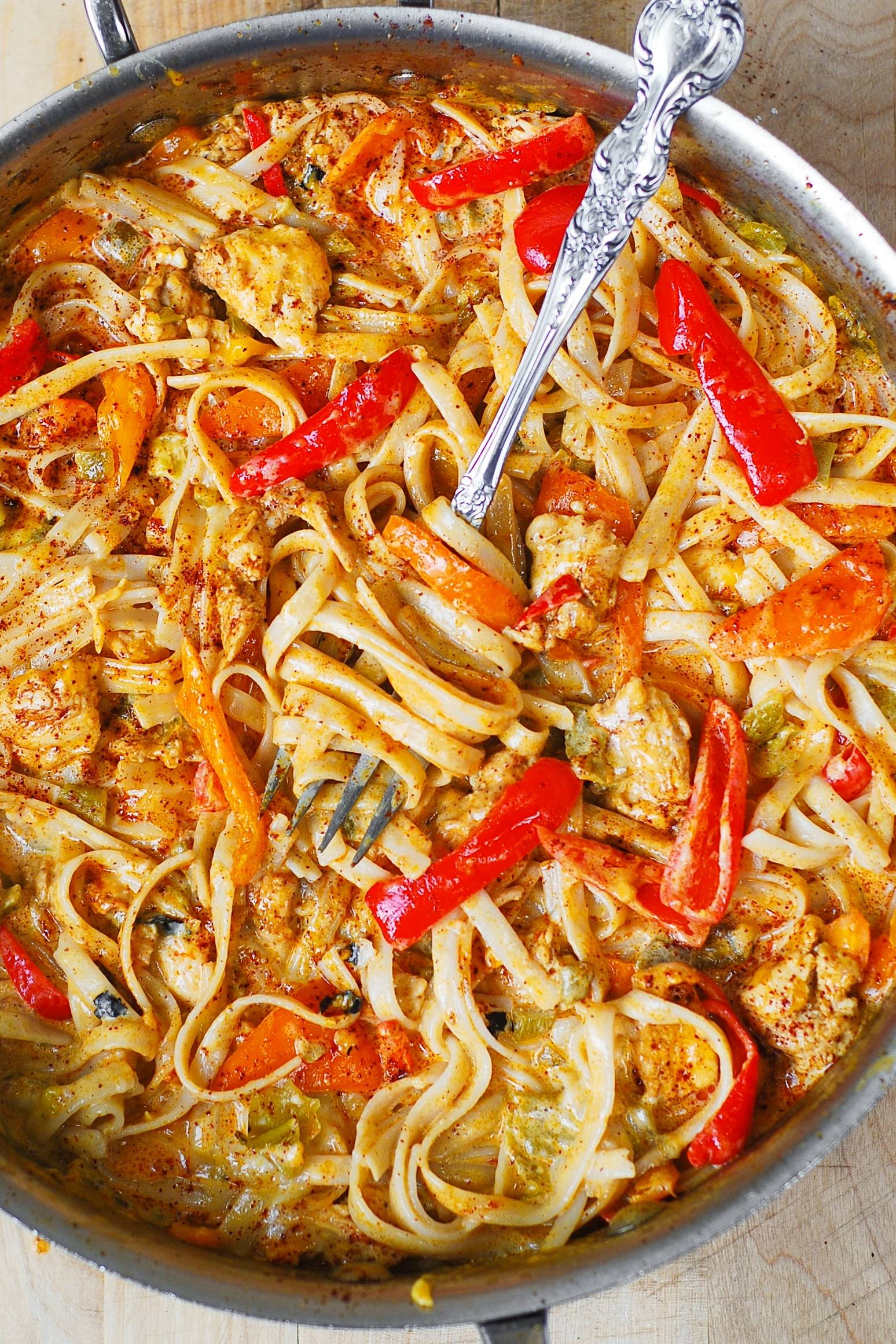 Mexican Chicken Pasta with Bell Peppers, Green Chiles, and a flavorful, creamy sauce made with Cheddar and Mozzarella Cheese!