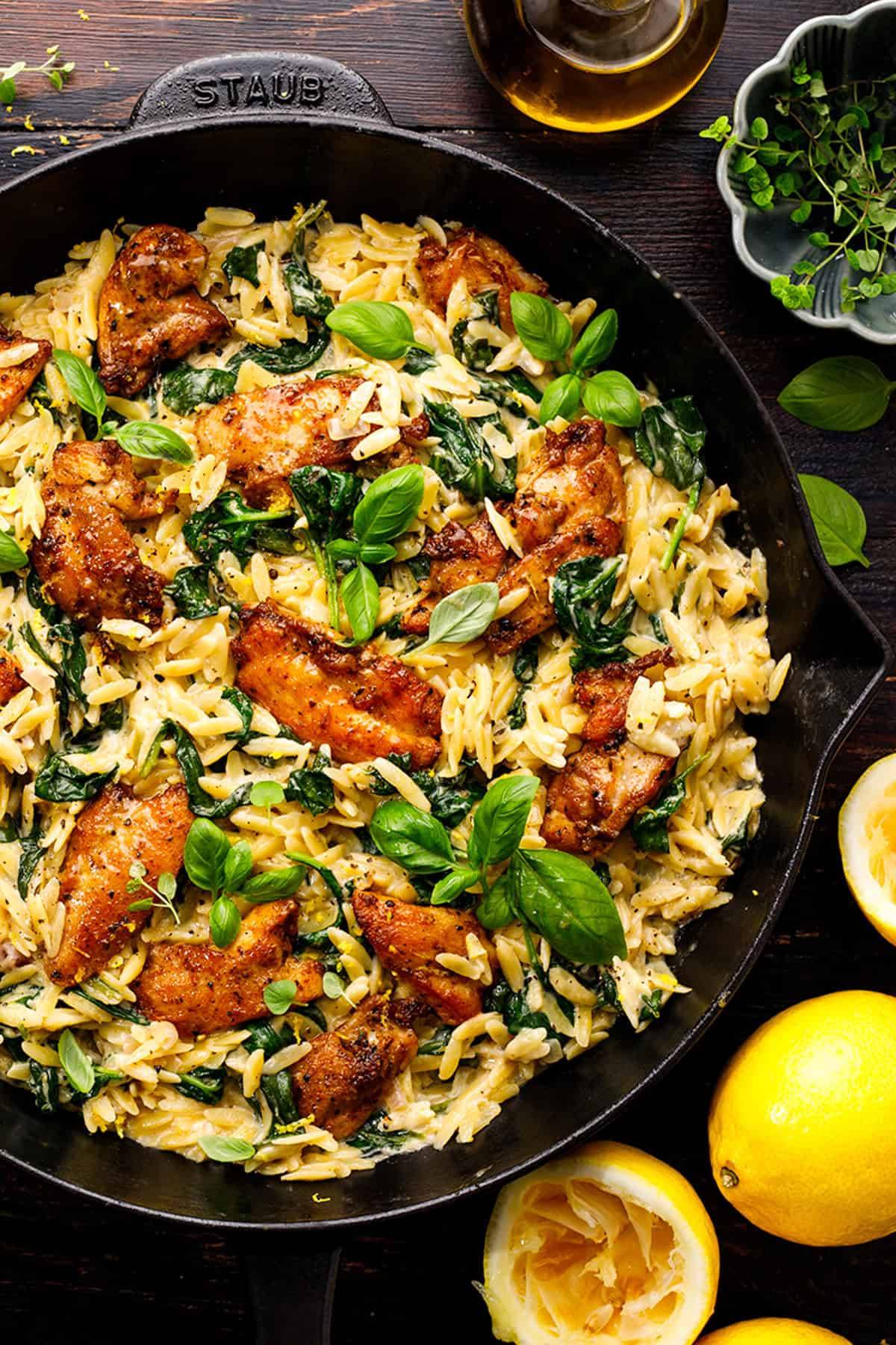 Lemon Chicken Orzo in a cast iron skillet.