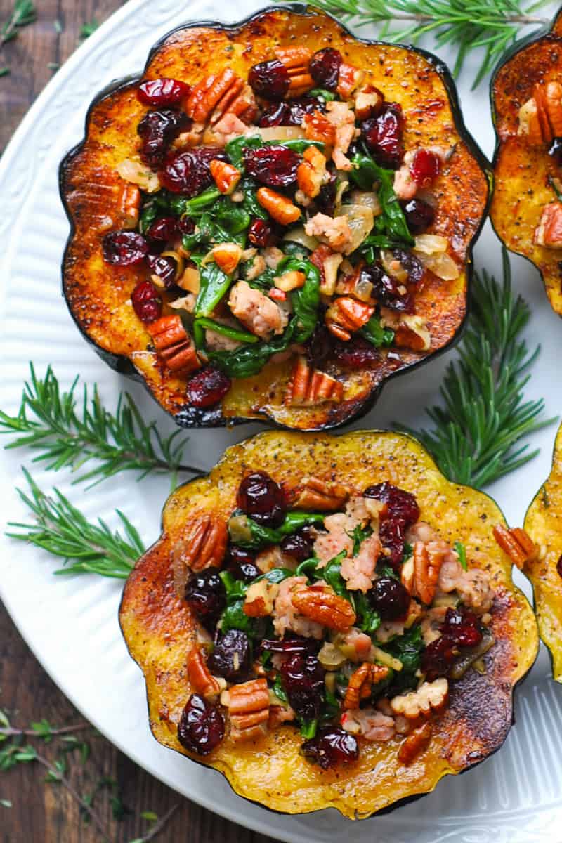 Sausage Stuffed Acorn Squash on a white plate.