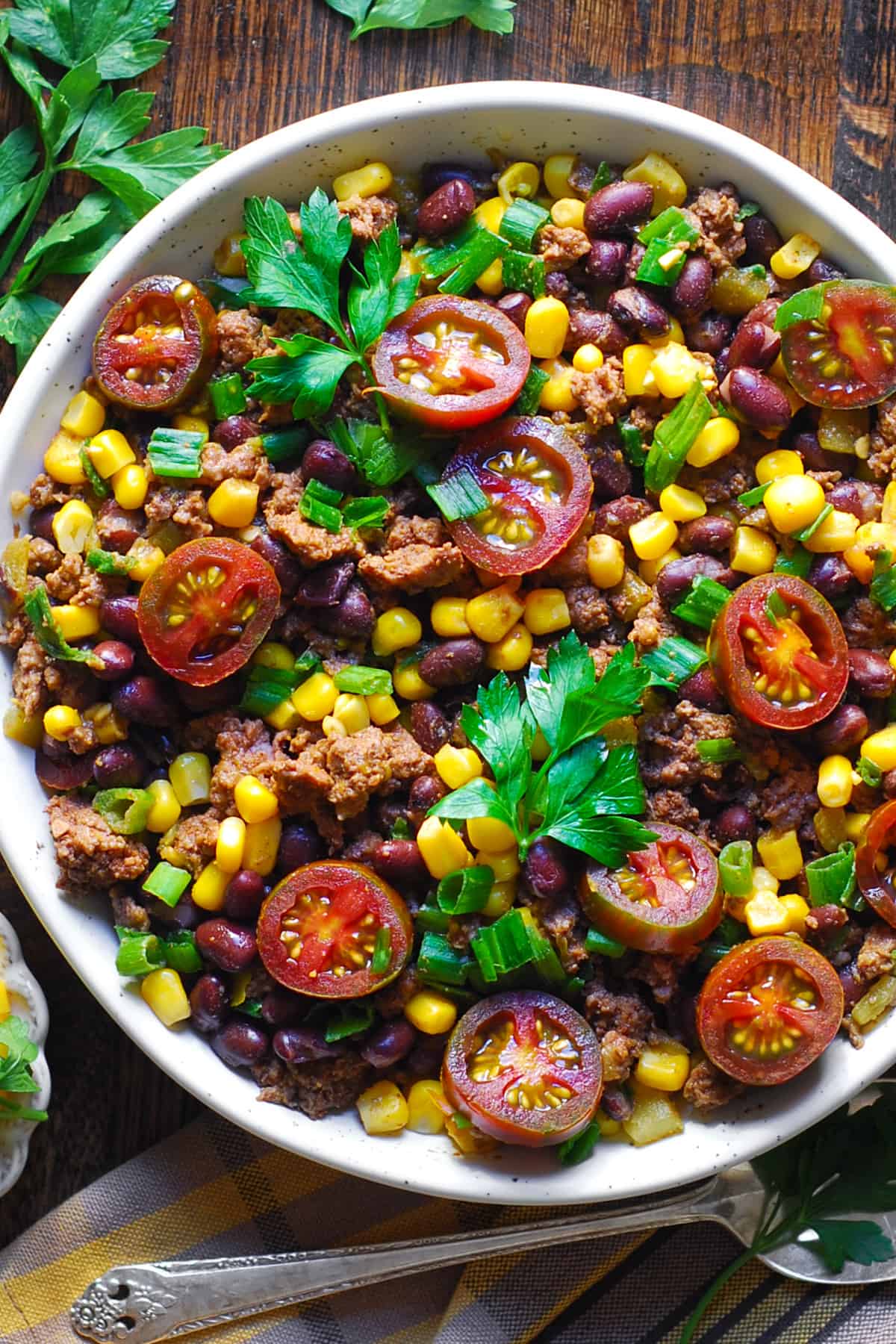 30-Minute, One-Pan Mexican Ground Beef Bowl with Corn, Black Beans, Tomatoes, Green Chilies, Green Onions.