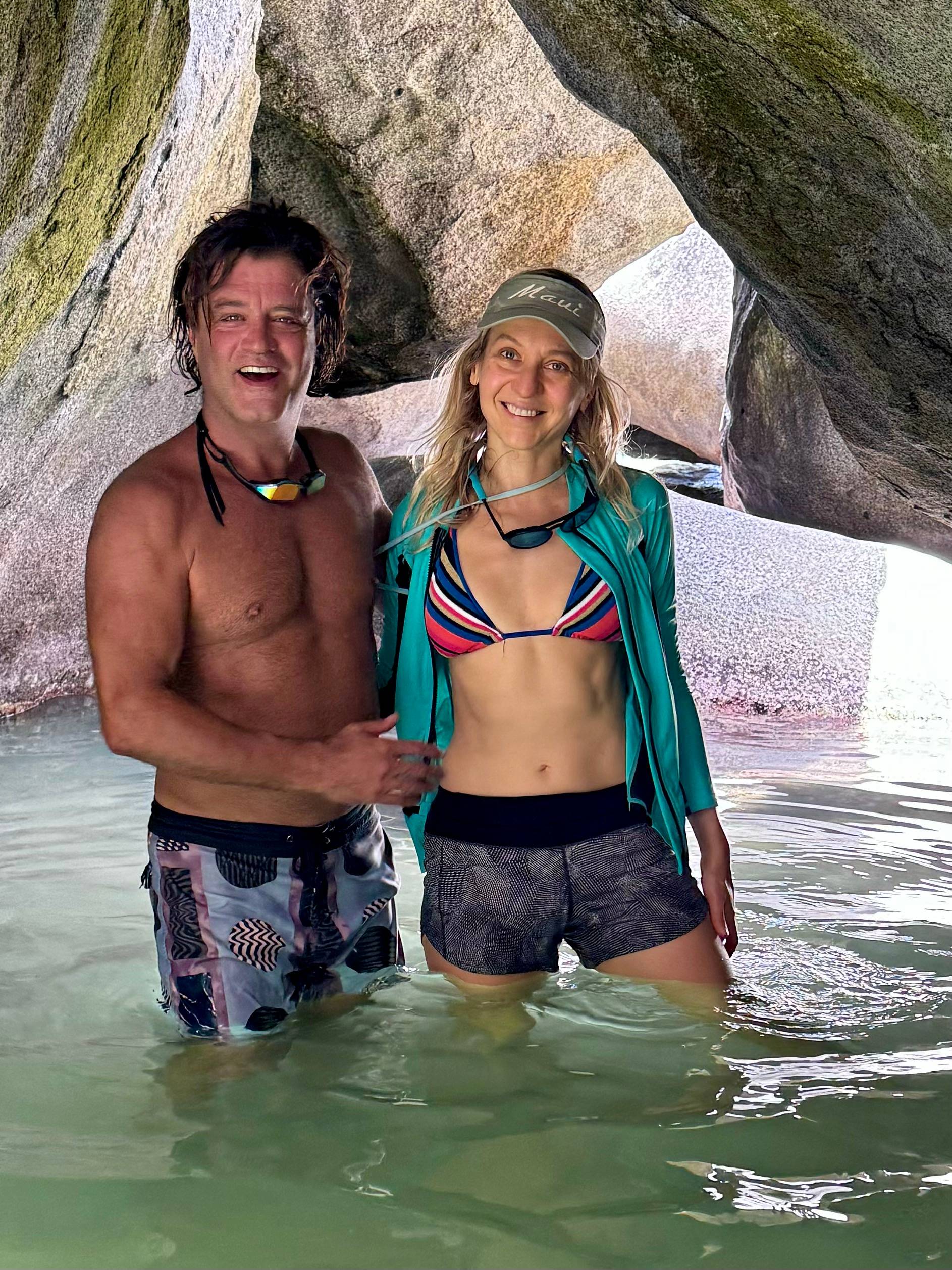 Julia and her husband in the caves with water pools.