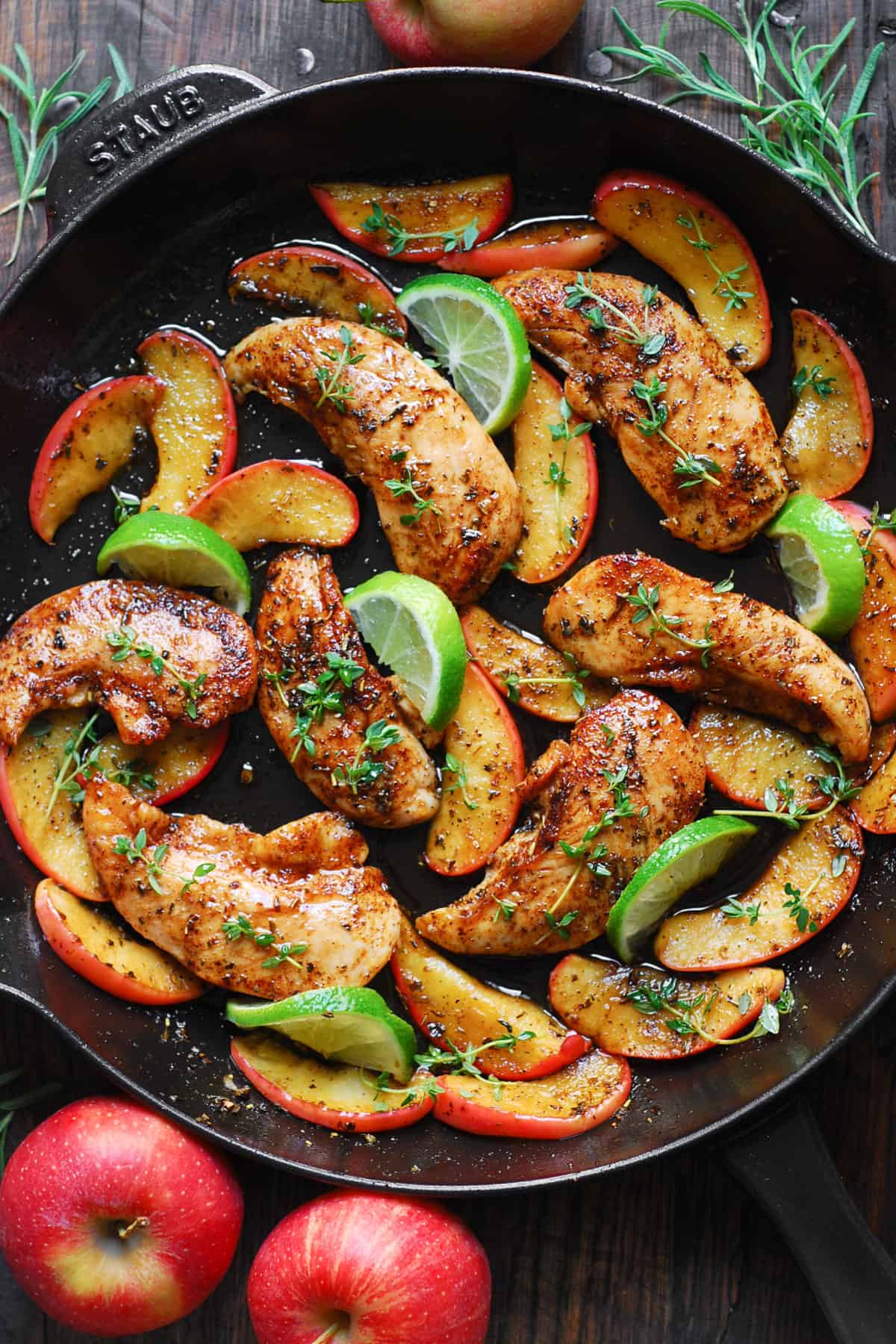 Autumn Apple Chicken with Maple-Lime Sauce in a cast iron skillet.