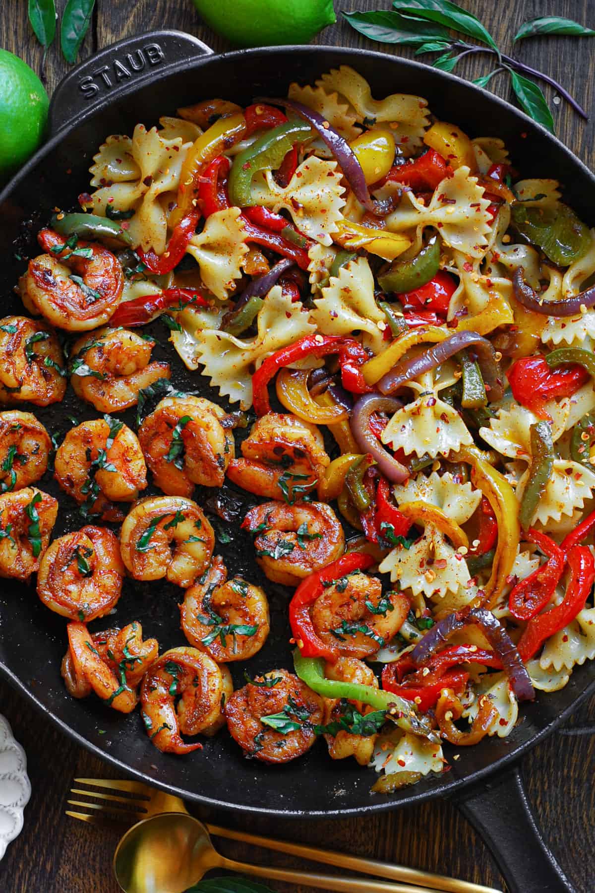 Fajita-Style Shrimp Pasta with Bell Peppers in a cast iron skillet.