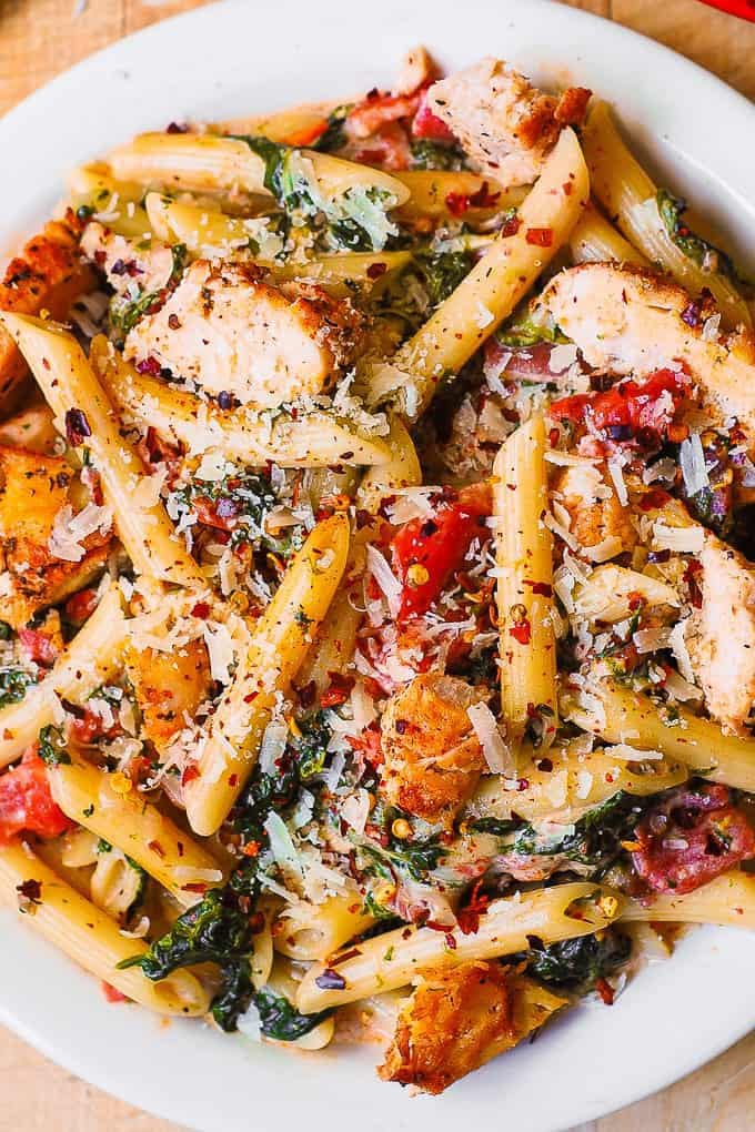 Chicken and Bacon Pasta with Spinach and Tomatoes in Garlic Cream Sauce