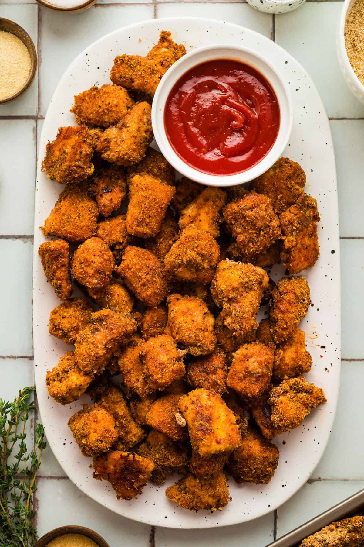 Baked Chicken Nuggets on a white plate.