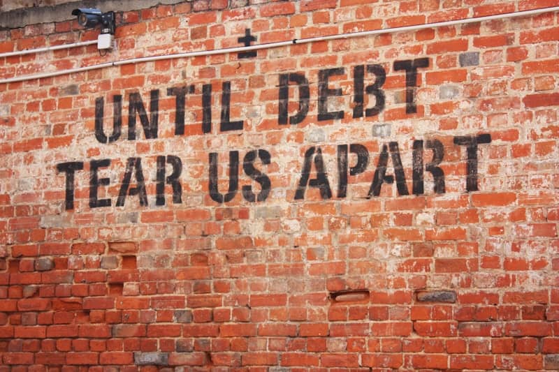 a brick wall with a message written on it