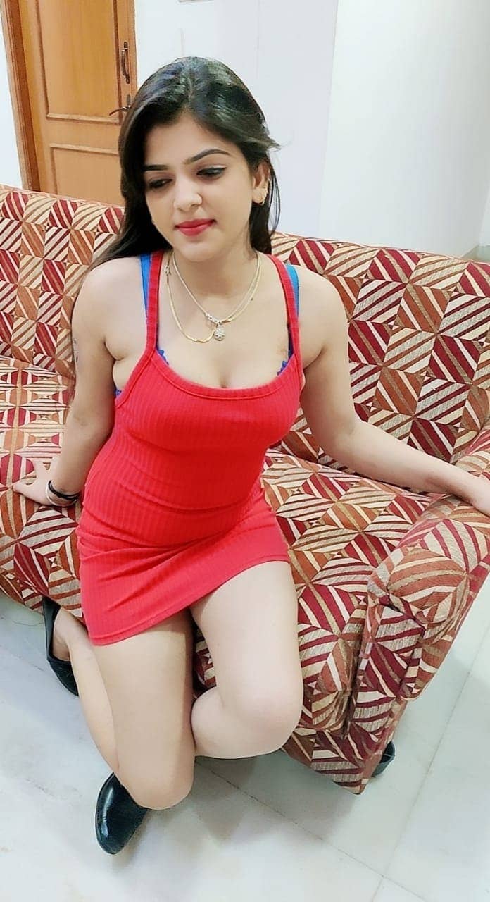 pune escort girl sitting in sofa