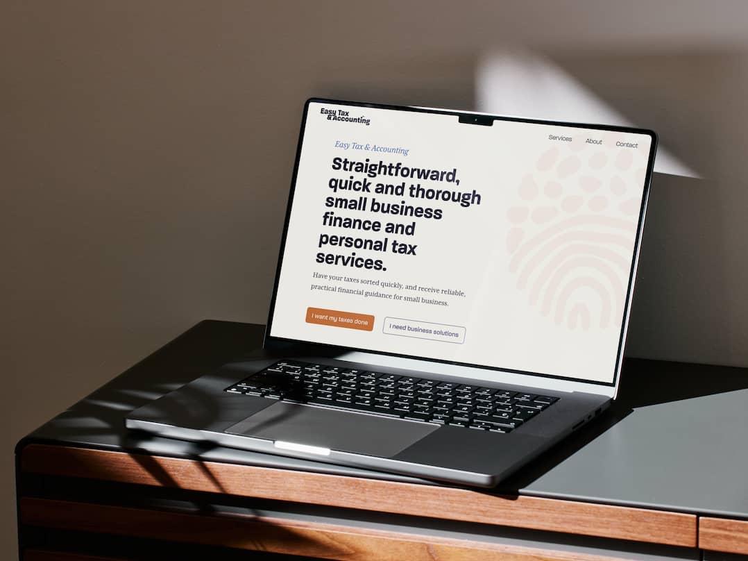 Laptop with website for Easy Tax and Accounting.