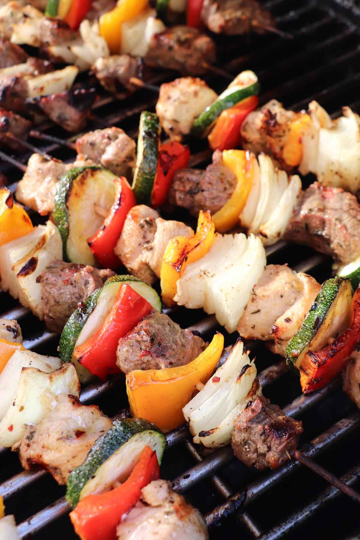 Chicken and steak kabobs on the grill