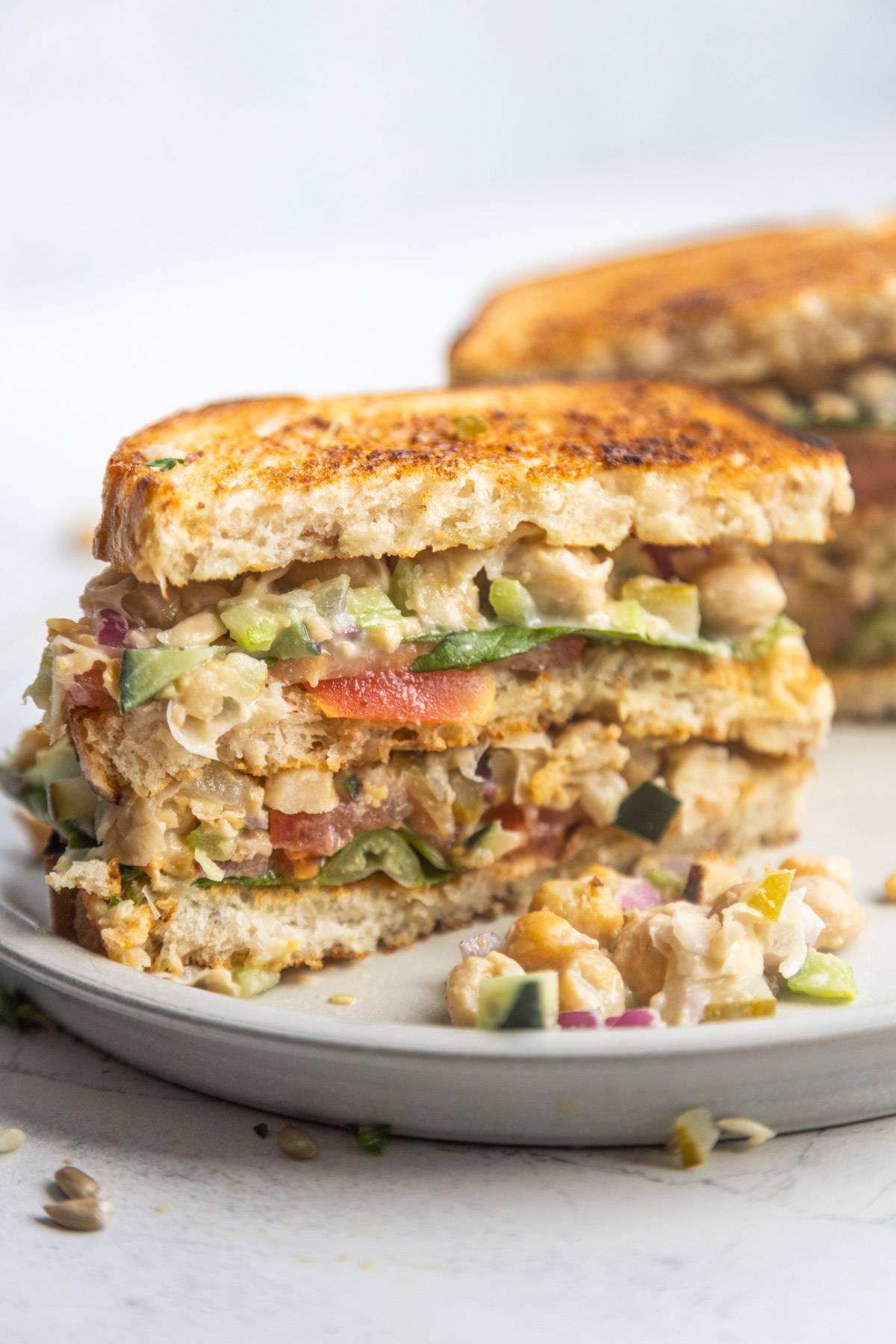 Chickpea salad sandwich on a plate.