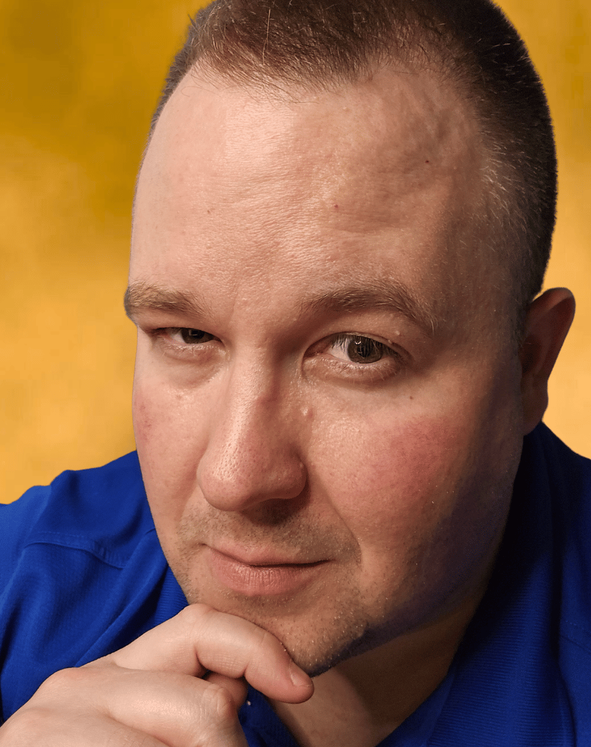 Handsome, debonair indie author staring into the camera.