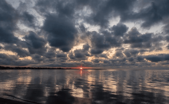 Storm clouds on a calm sea