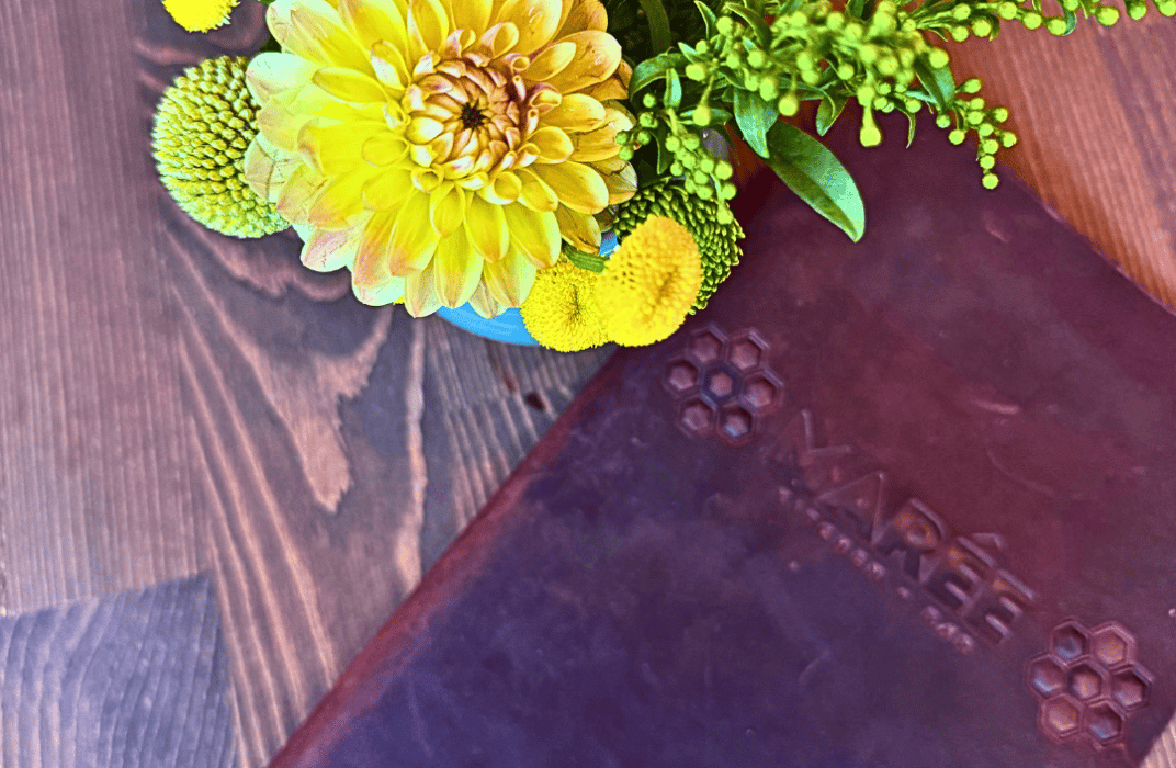 The new hand-embossed leather wine book at Marée, the name pressed into the cover
