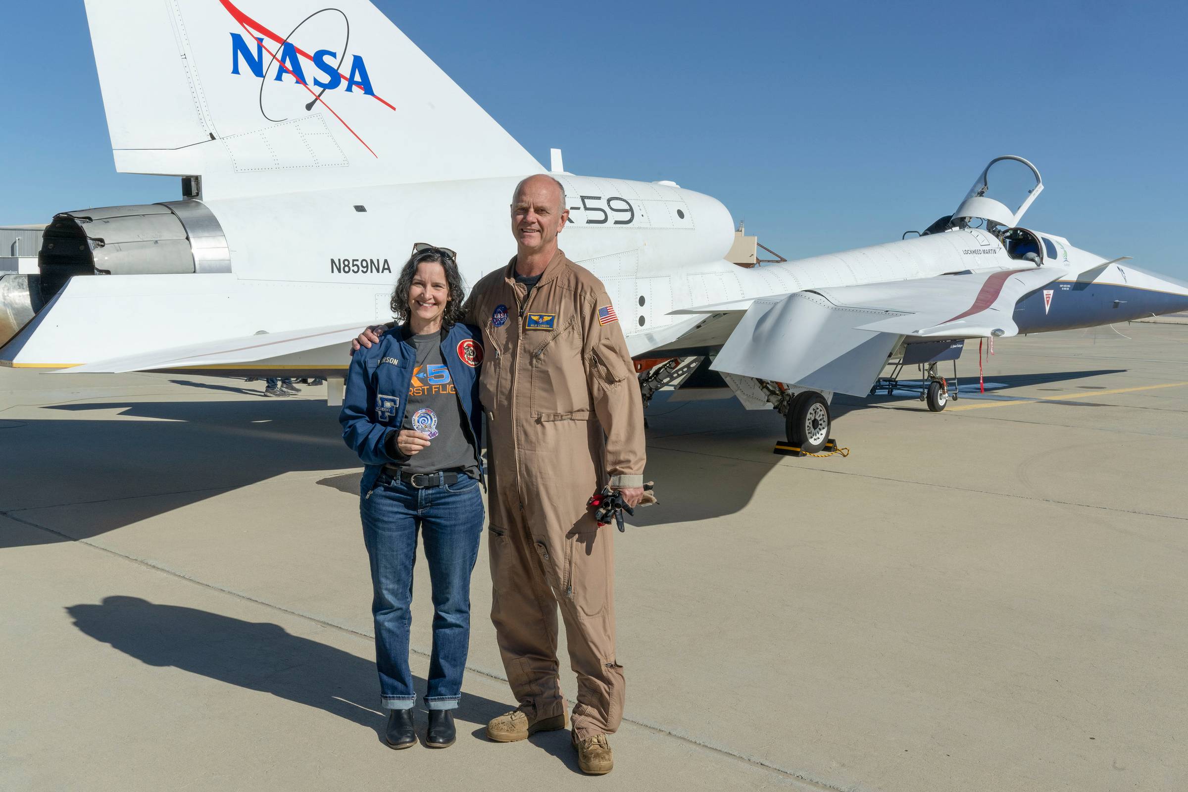 Kirsten and Nils Larson in front of the NASA X-59