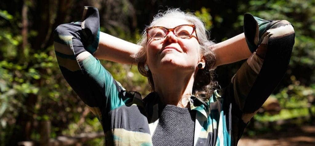 Heidi Fischbach, author of email, head back, face in sun