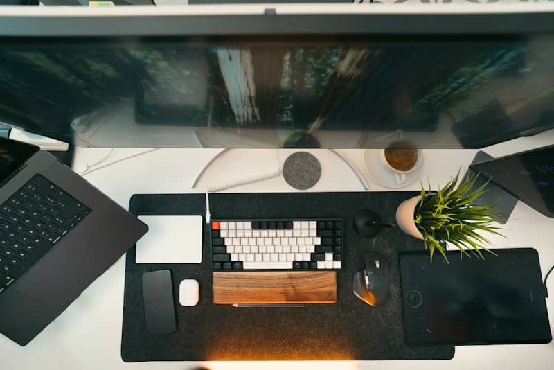 A clean and modern workspace with dual monitors.