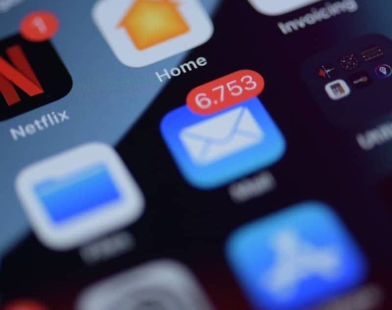 a close up of a cell phone with various app icons