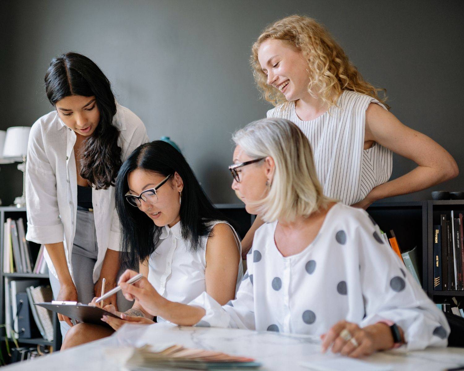 Group of people working collaboratively together