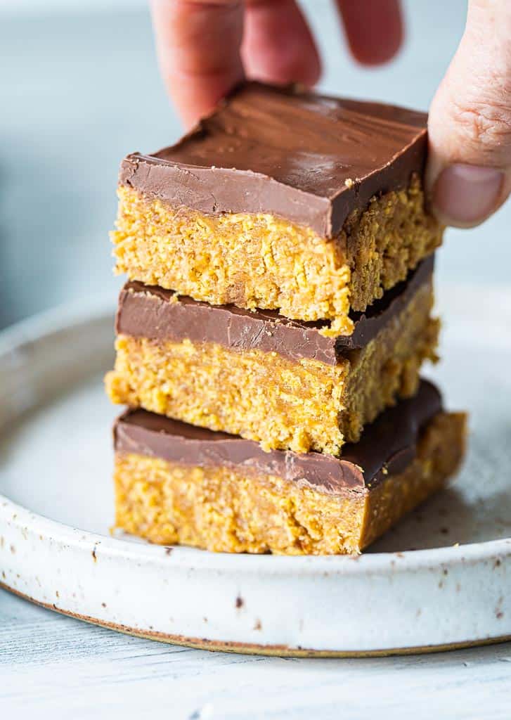stacked peanut butter bars on a plate