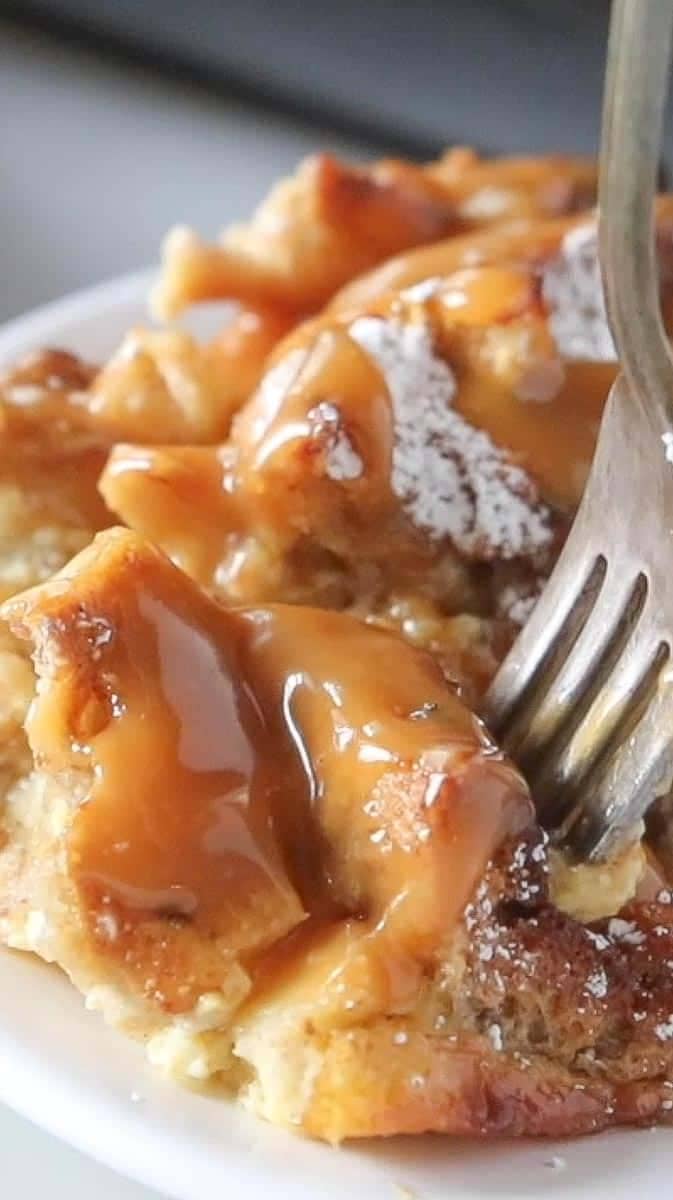 serving bowl with pineapple fluff topped with two cherries