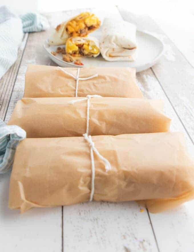 camping burritos rolled in parchment paper