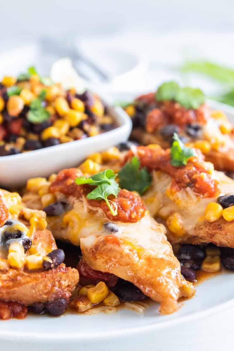 strawberry trifle layered in a trifle bowl
