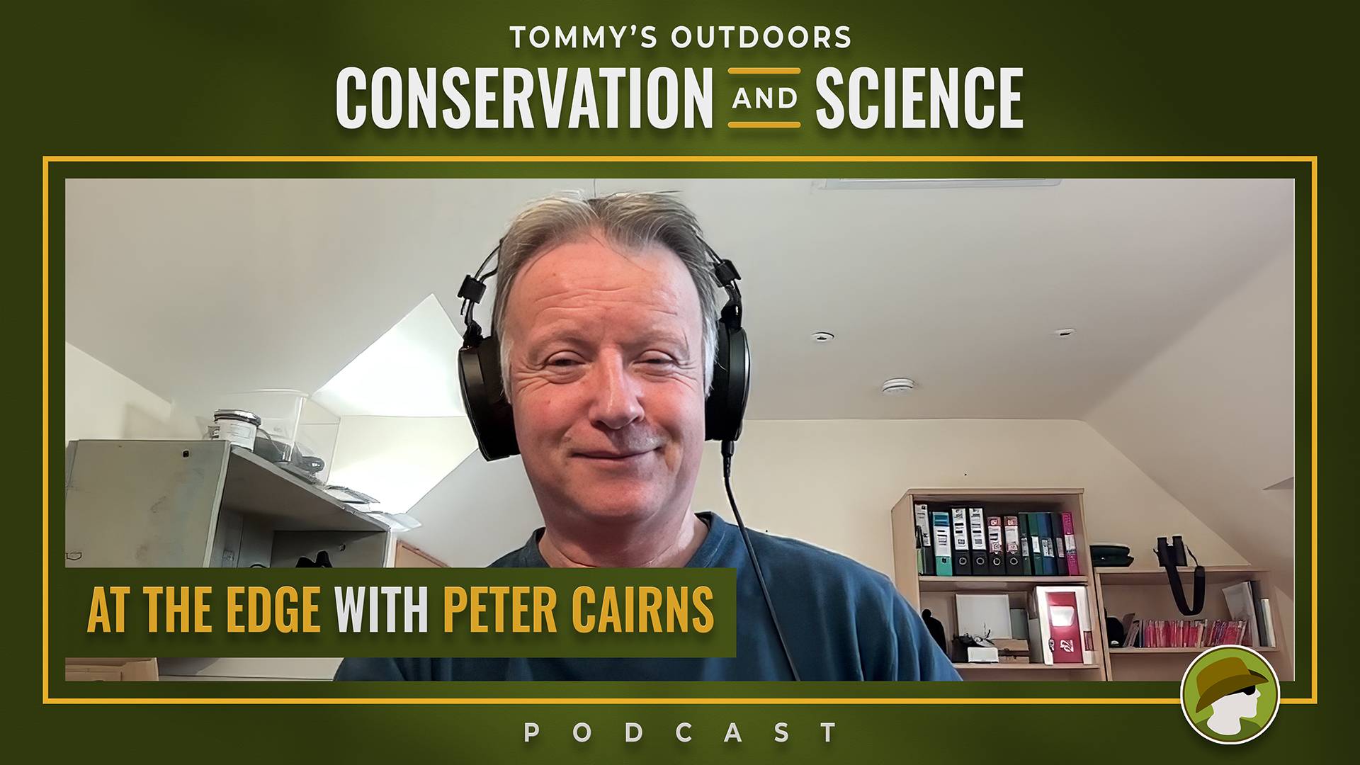 Cover art for the 'Tommy's Outdoors Conservation and Science Podcast' episode titled 'At the Edge with Peter Cairns'. A man with grey hair wearing black over-ear headphones and a teal t-shirt smiles warmly at the camera. He appears to be recording from a 