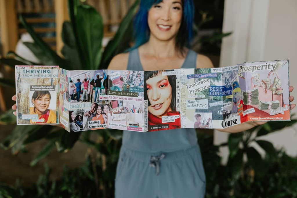 Jennifer Ayako Lee holding up a collaged accordion book Right-Brain Business Plan