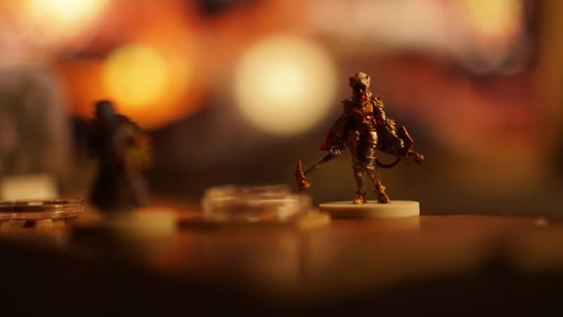 a close up of a toy figurine on a table