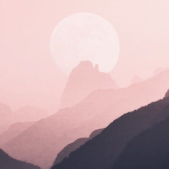moon near mountain ridge