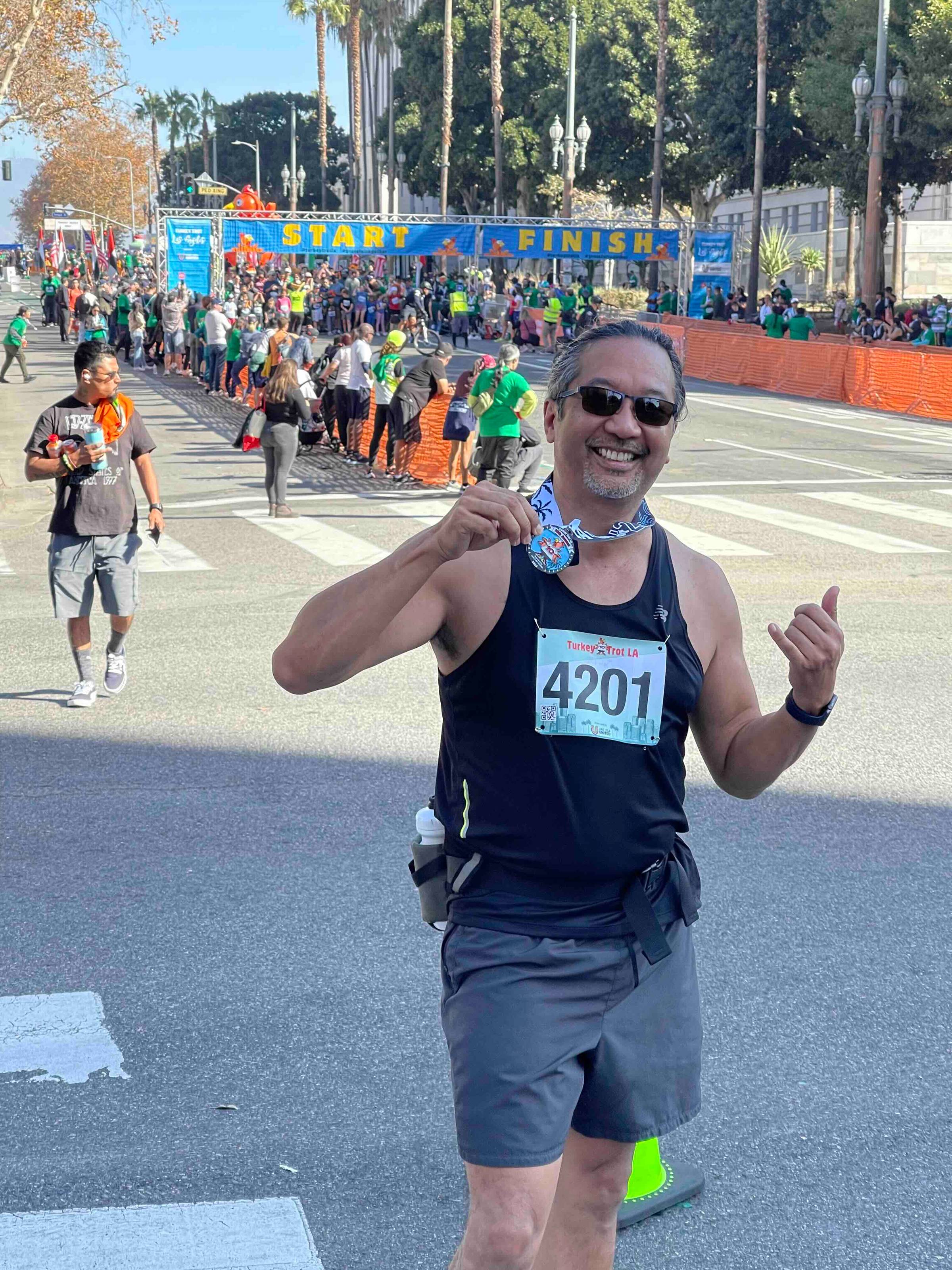 Joselito holding medal