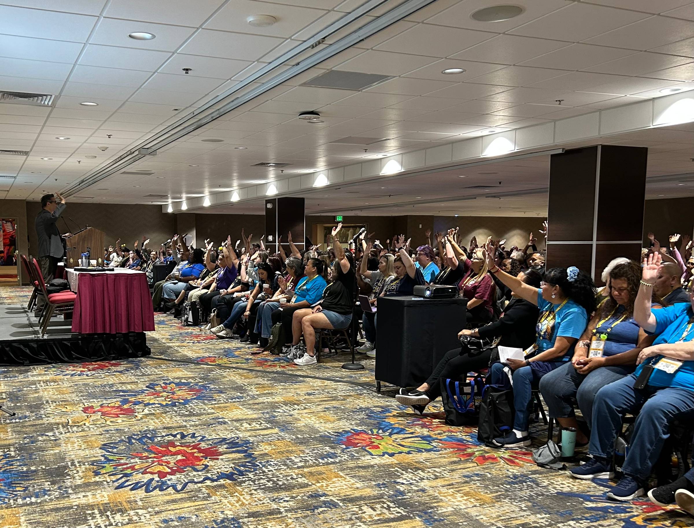 Joselito speaking at a conference
