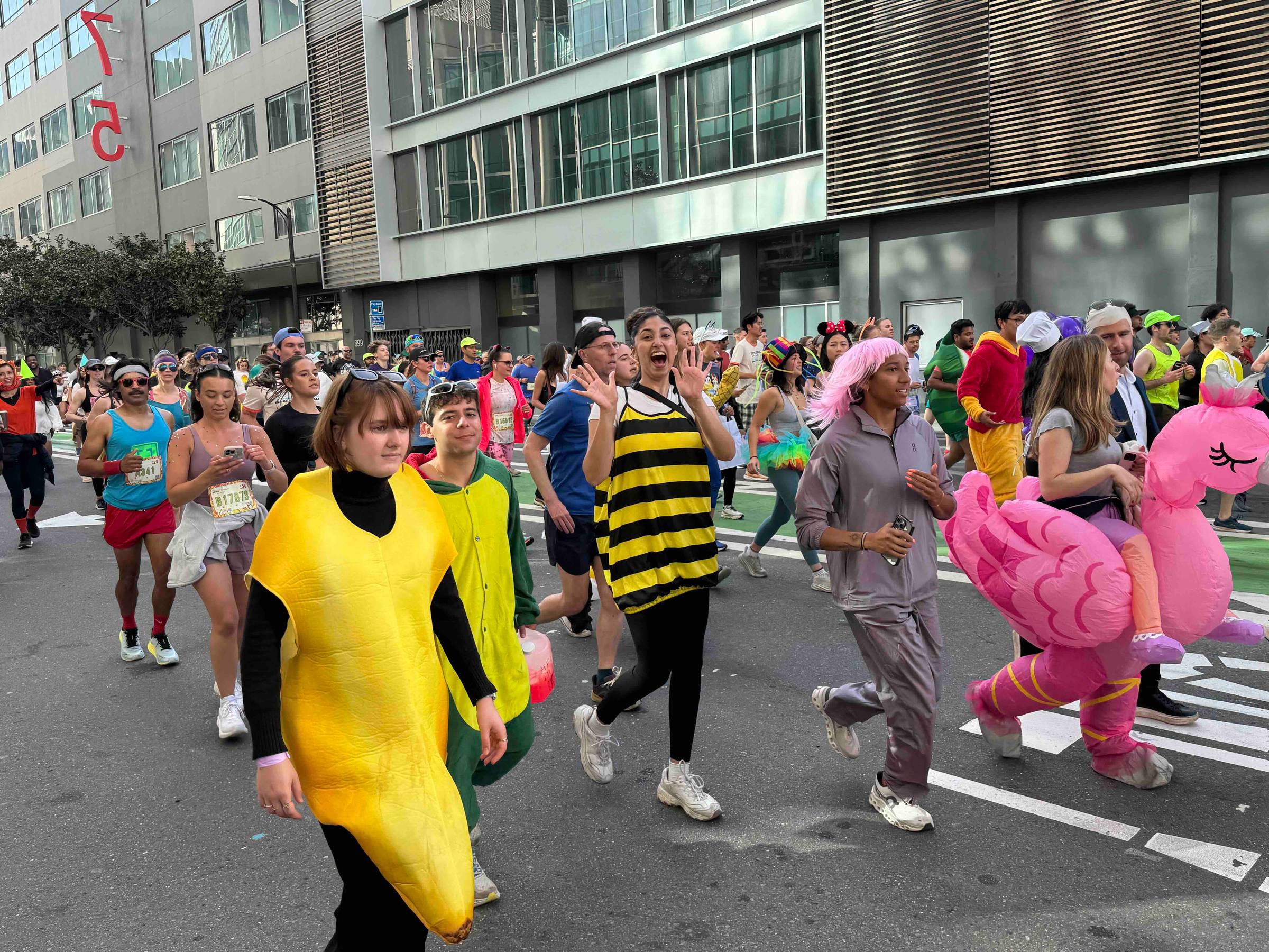 woman in bumblebee costume waving