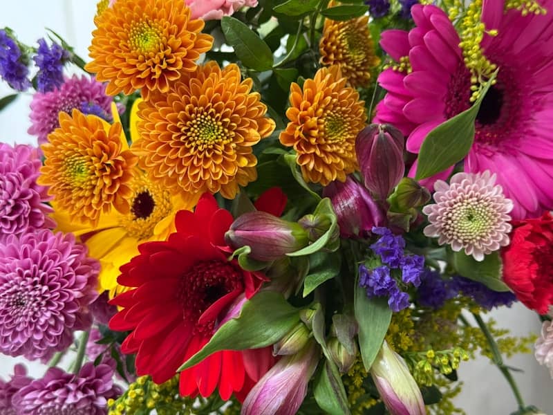 A vibrant bouquet of assorted colorful flowers.