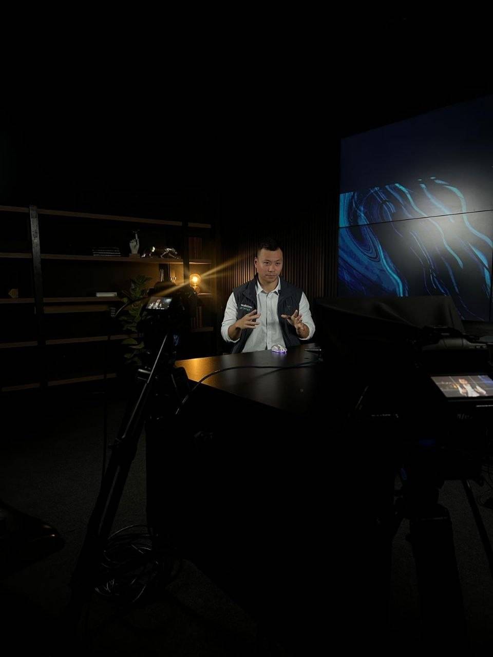 Behind the scenes during a studio video recording.