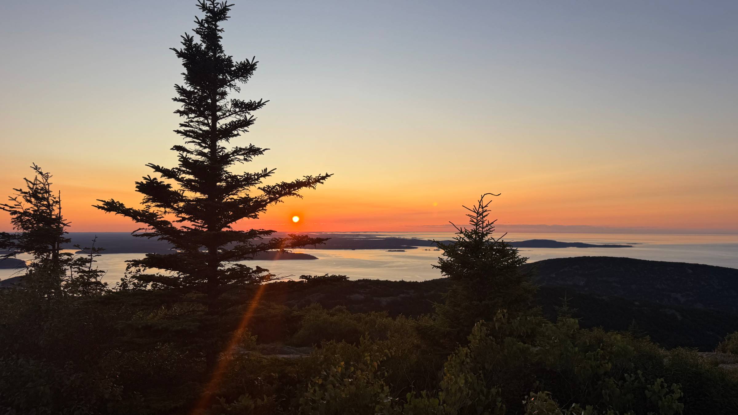 view of sunrise from cadillac mountain in acadia national park
