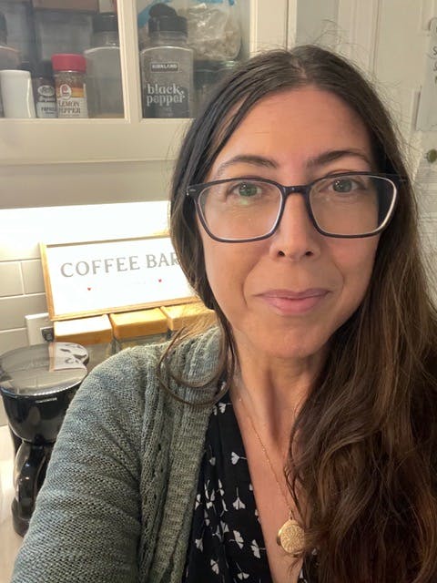 Picture of Teacher, Alexandra Kostoulas in her kitchen.