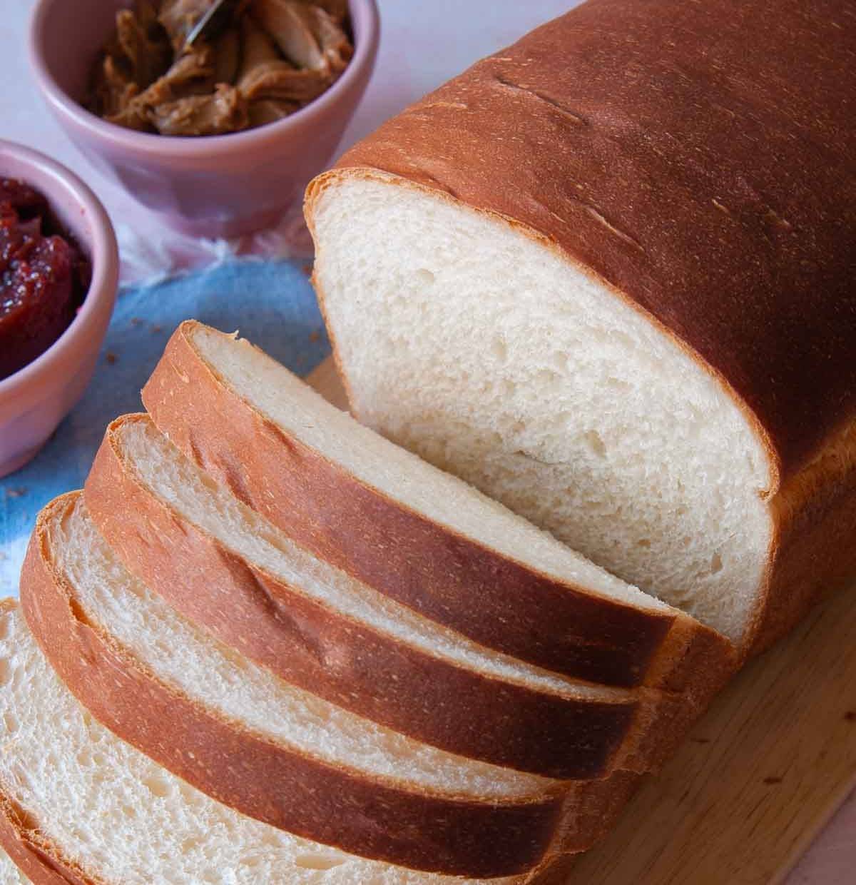 sliced loaf of condensed milk bread machine loaf