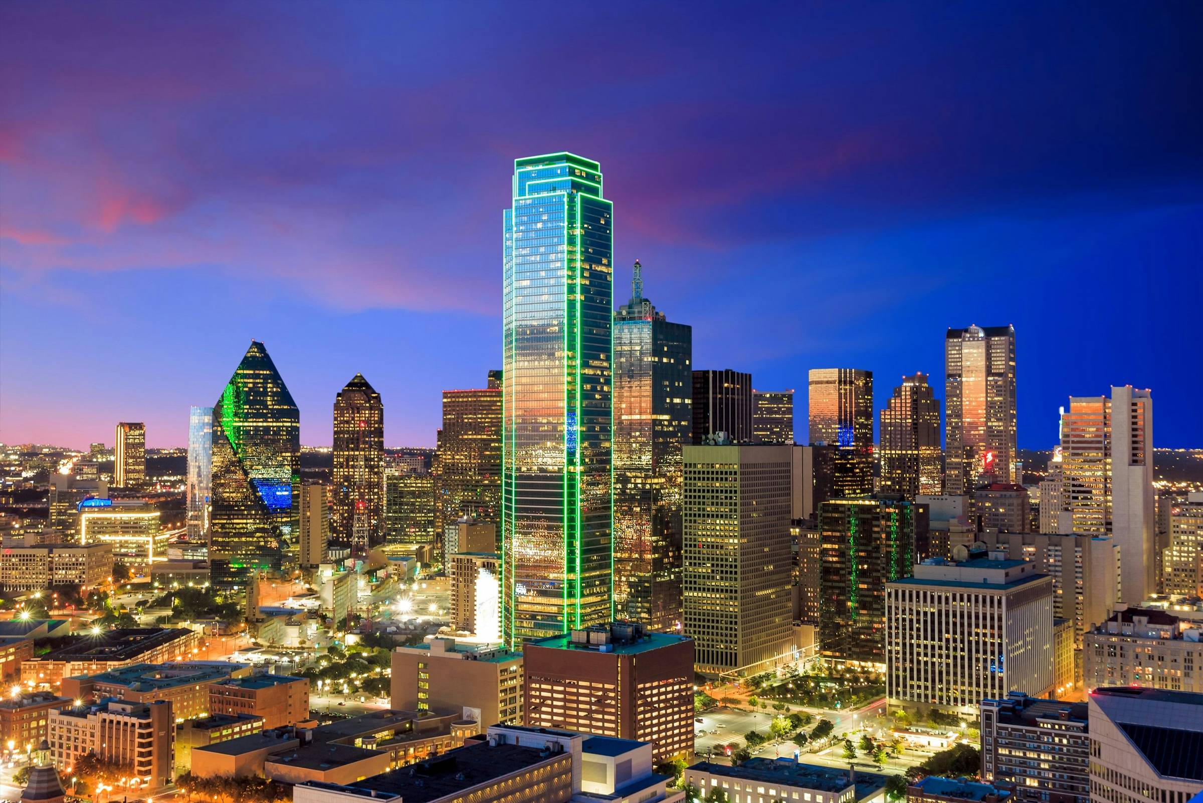 Image of downtown Dallas at dusk.